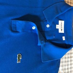 Lacoste Blue polo shirt never worn. Size XL